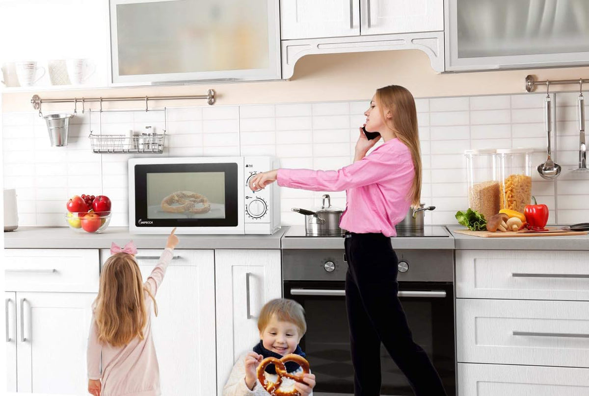700-Watts 0.6 Cubic Feet White Countertop Microwave Oven I189